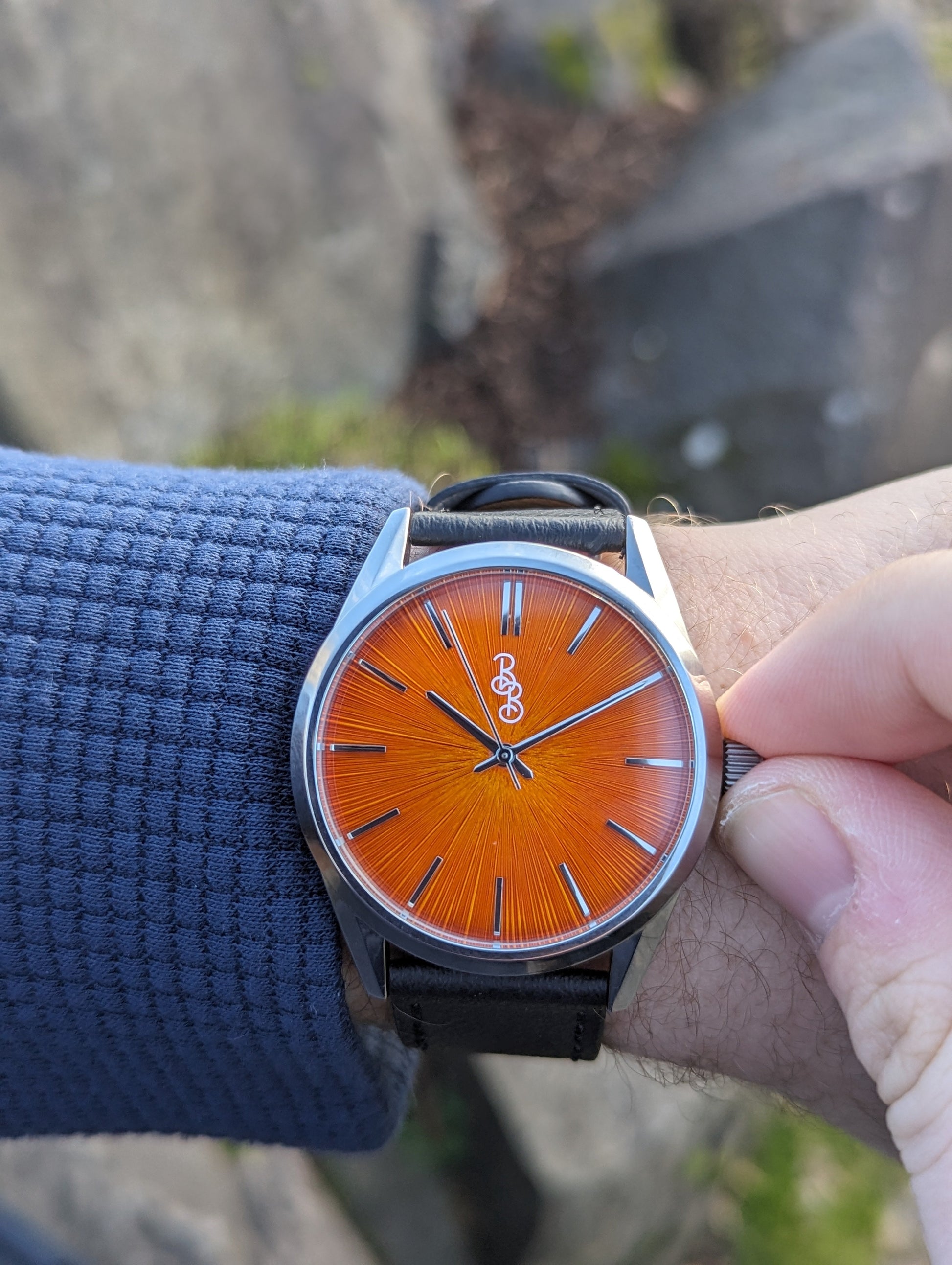 Orange Sunburst Watch by The Beyond Boring Watch Company